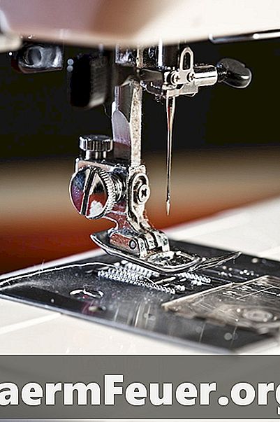 Як налаштувати систему подачі швейної машини Elgin
