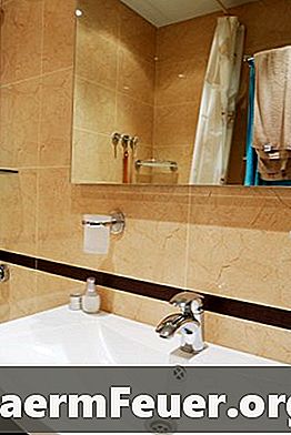 Kā izrotāt vannas istabu ar melnu granīta grīdas segumu