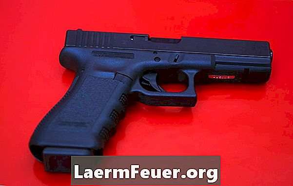 Como instalar a mira LaserMax em uma pistola Glock