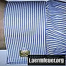 Hoe manchetknopen op een overhemd te bevestigen
